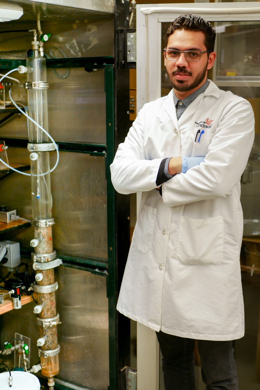 Dewidar poses in lab