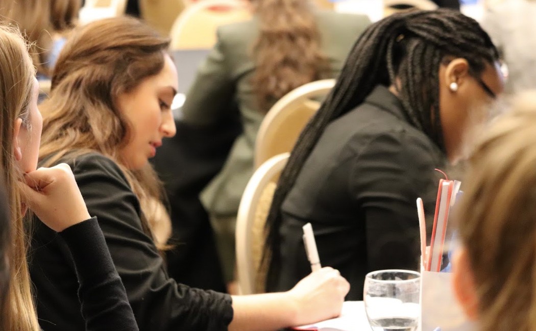 Attendees take notes at Empowerment Day 2019