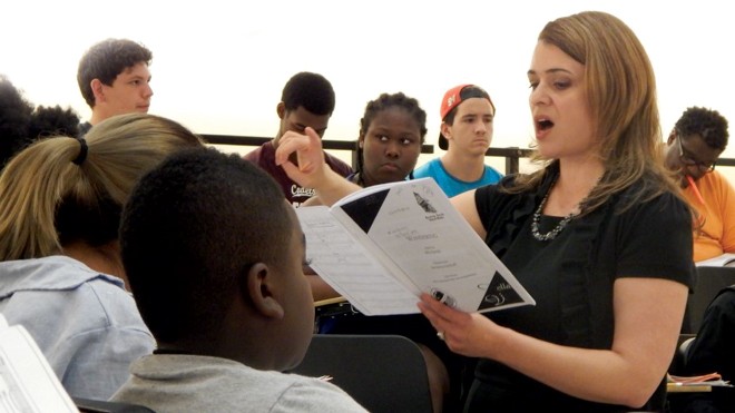 CCM faculty member Eva Floyd instruct a classroom of young music students.