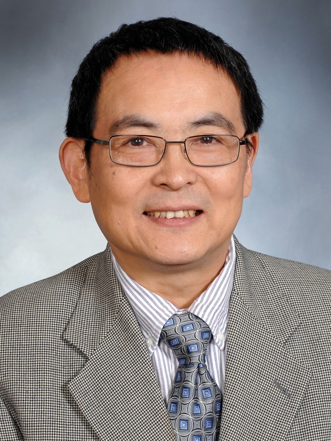 headshot of Ou Ma, Ph.D.