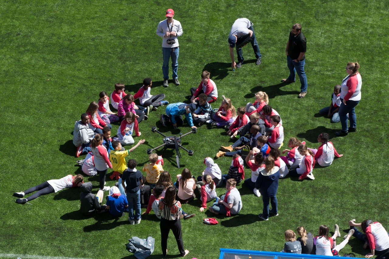 Local elementary school students are shown professor Cohen’s Drones at Nippert Stadium during Research Week & Innovation Week April 2, 2019. UC/Joseph Fuqua II 
