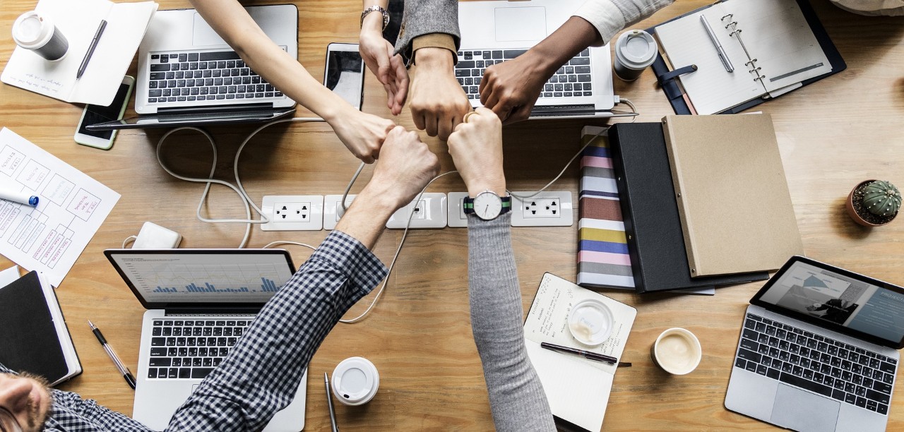 group fist bumps achievement