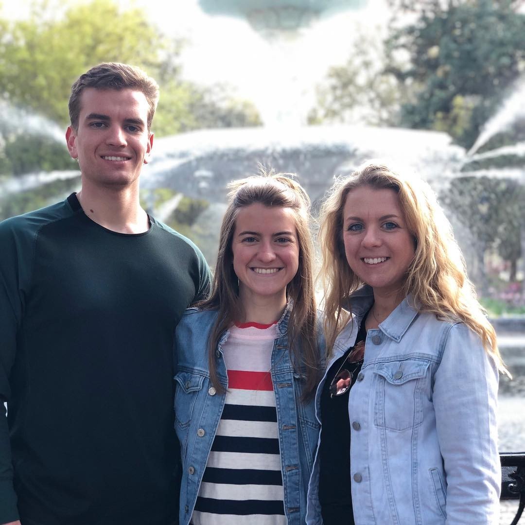 Scottie Emmert shown with his sisters, Annie Emmert, a nursing student at UC, and Betsy Emmert, a UC law school student.