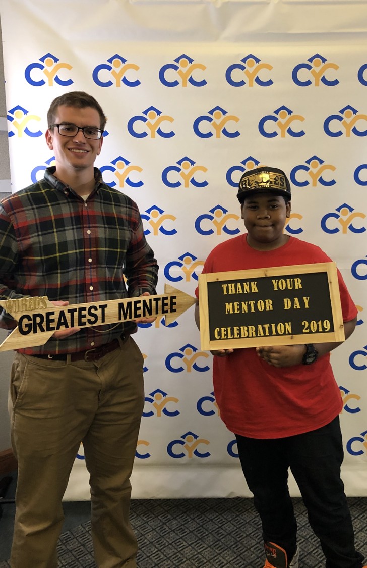 Scottie Emmert is shown with his mentee Tayveon Fitzpatrick.