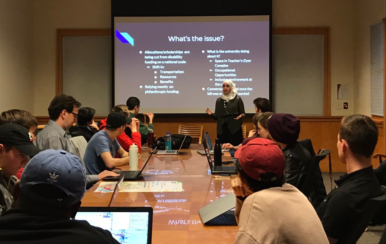 Mariam Elgafy speaks before a crowd at a UC Student Activities and Leadership Development Impact Symposium.