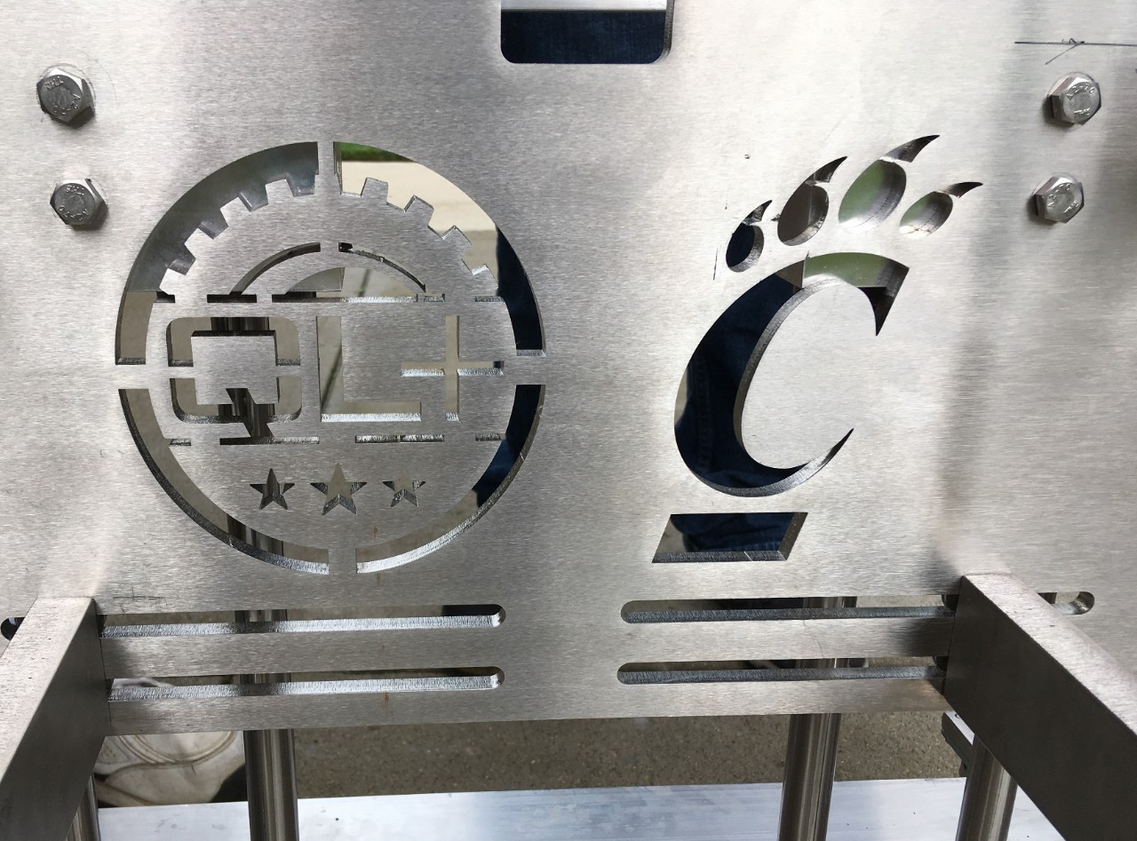 A closeup of the Bearcat logo laser-cut into the aluminum frame of the lift.