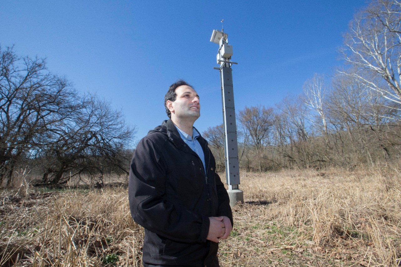 UC professor Reza Soltanian gestured as he spoke about his research at Groundwater Observatory at Miami Whitewater Forest. UC/Joseph Fuqua II