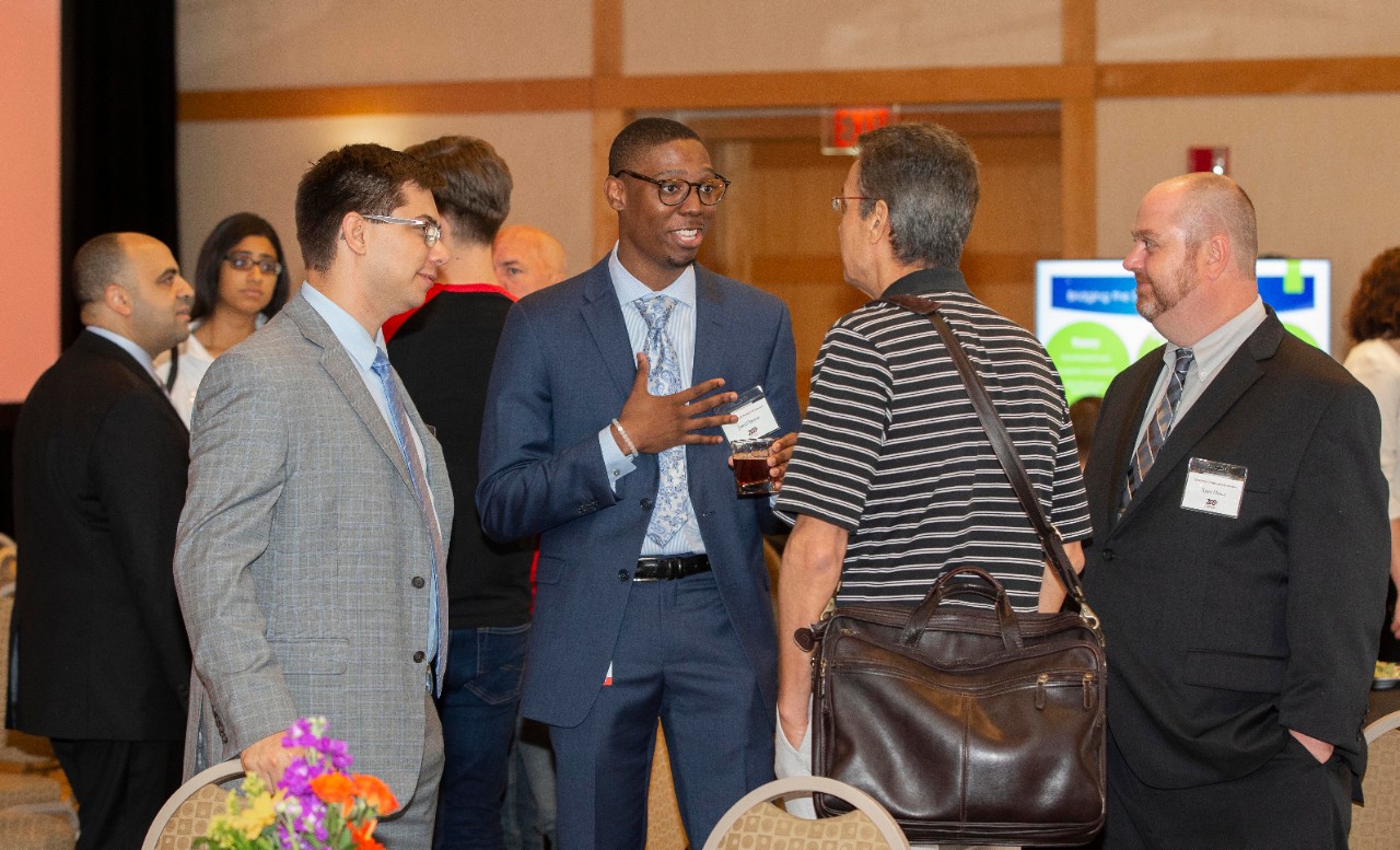 People enjoyed the presenters during the Ohio Cyber Range and the Ohio Adjutant General's office symposium Kingsgate Marriott center. UC/Joseph Fuqua II