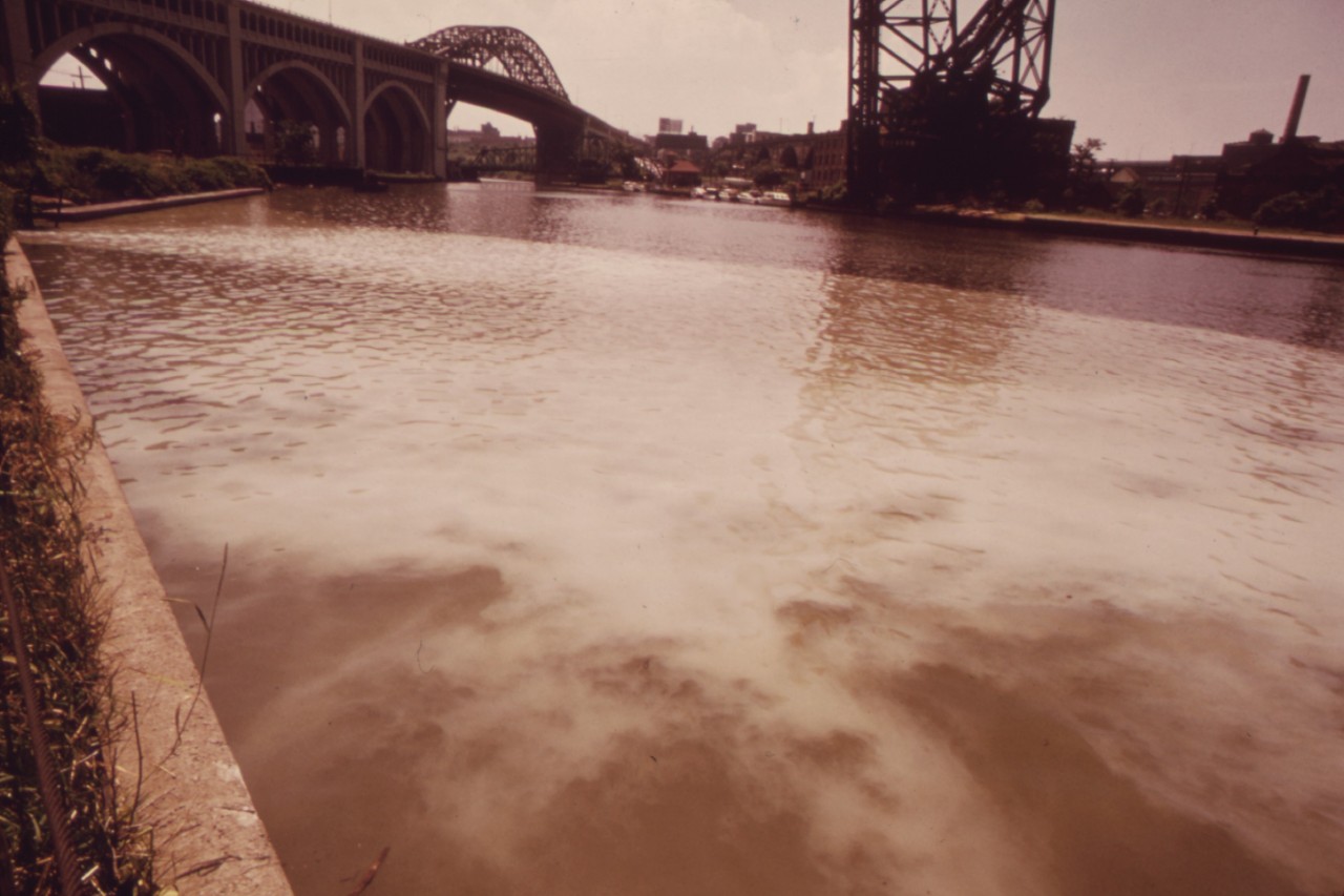 Discolored water in the Cyahoga River from sewage discharged from city pump station