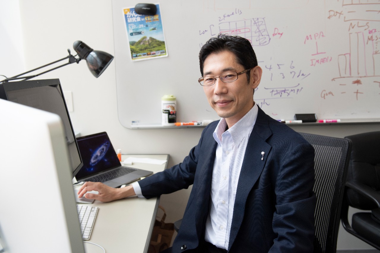 Atsuo Sasaki, PhD, in his lab and office.