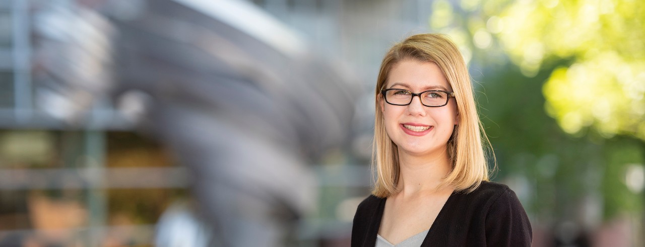 Chloe Elleman shown in front of the UC College of Medicine.