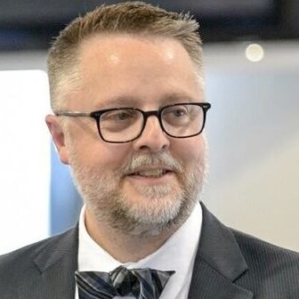 Head shot of man with glasses