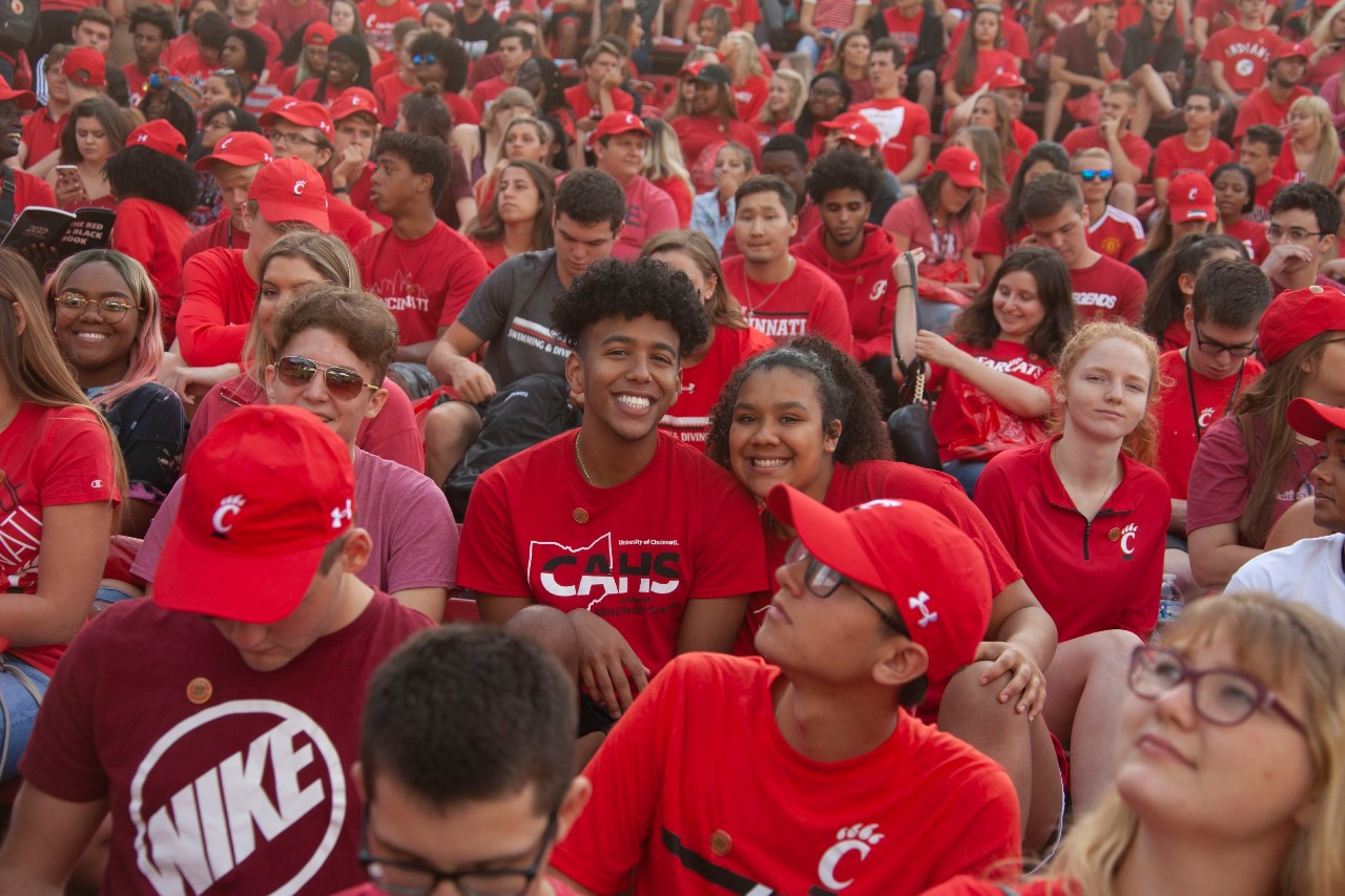 Diverse crowd of students in red