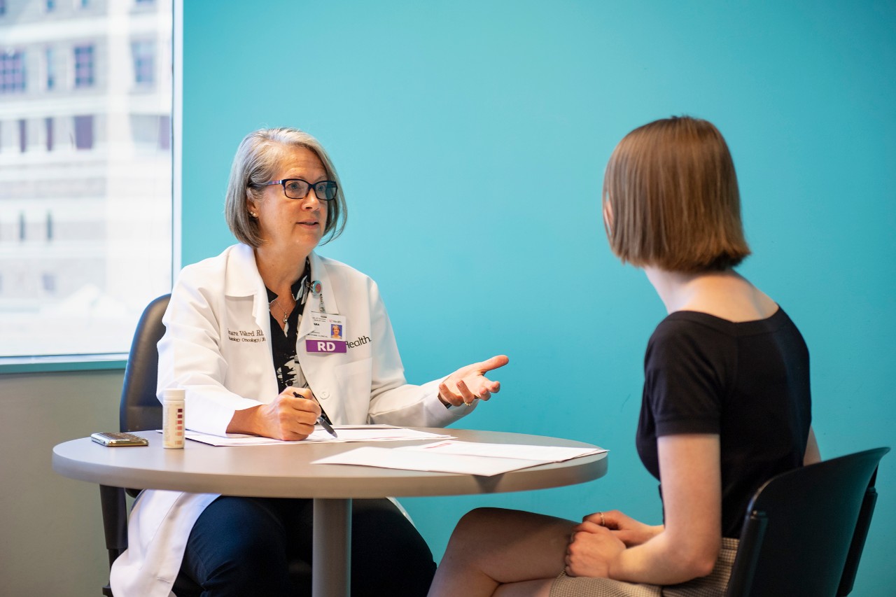 Tamara Ward RD, CSO, LD, Clinical Dietitian, speaking with mock patient. (Keto Story)