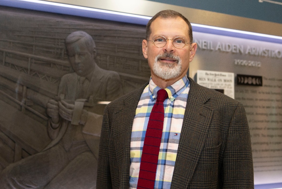 UC professor John Emmert, new director of National Science Foundation research lab shown here in his lab and Armstrong’s relief at Rhodes hall.  UC/Joseph Fuqua II