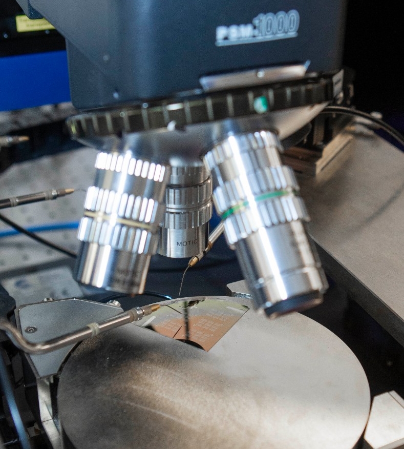 UC professor John Emmert, new director of National Science Foundation research lab shown here in his lab and Armstrong’s relief at Rhodes hall.  UC/Joseph Fuqua II