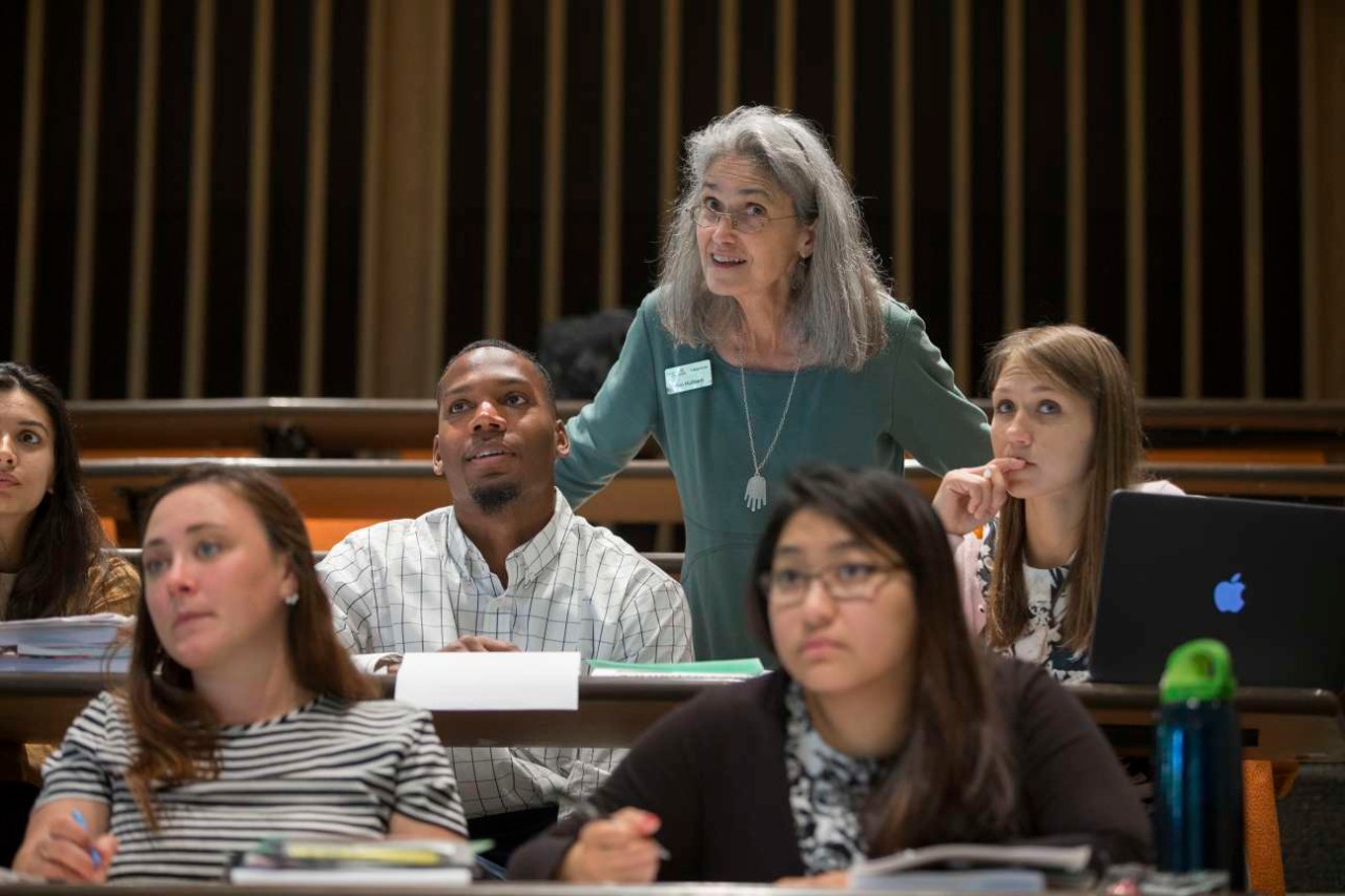 Students and instructor in the classroom settiing