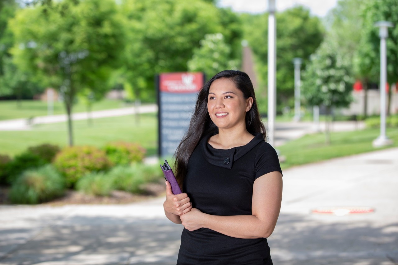 Student walking across campus