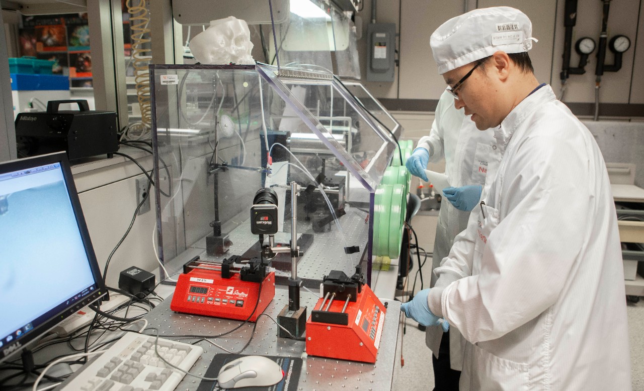 Daewoo Han, PhD students shown here in professor Andrew Steckl’s lab at Rhodes Hall. UC/ Joseph Fuqua II