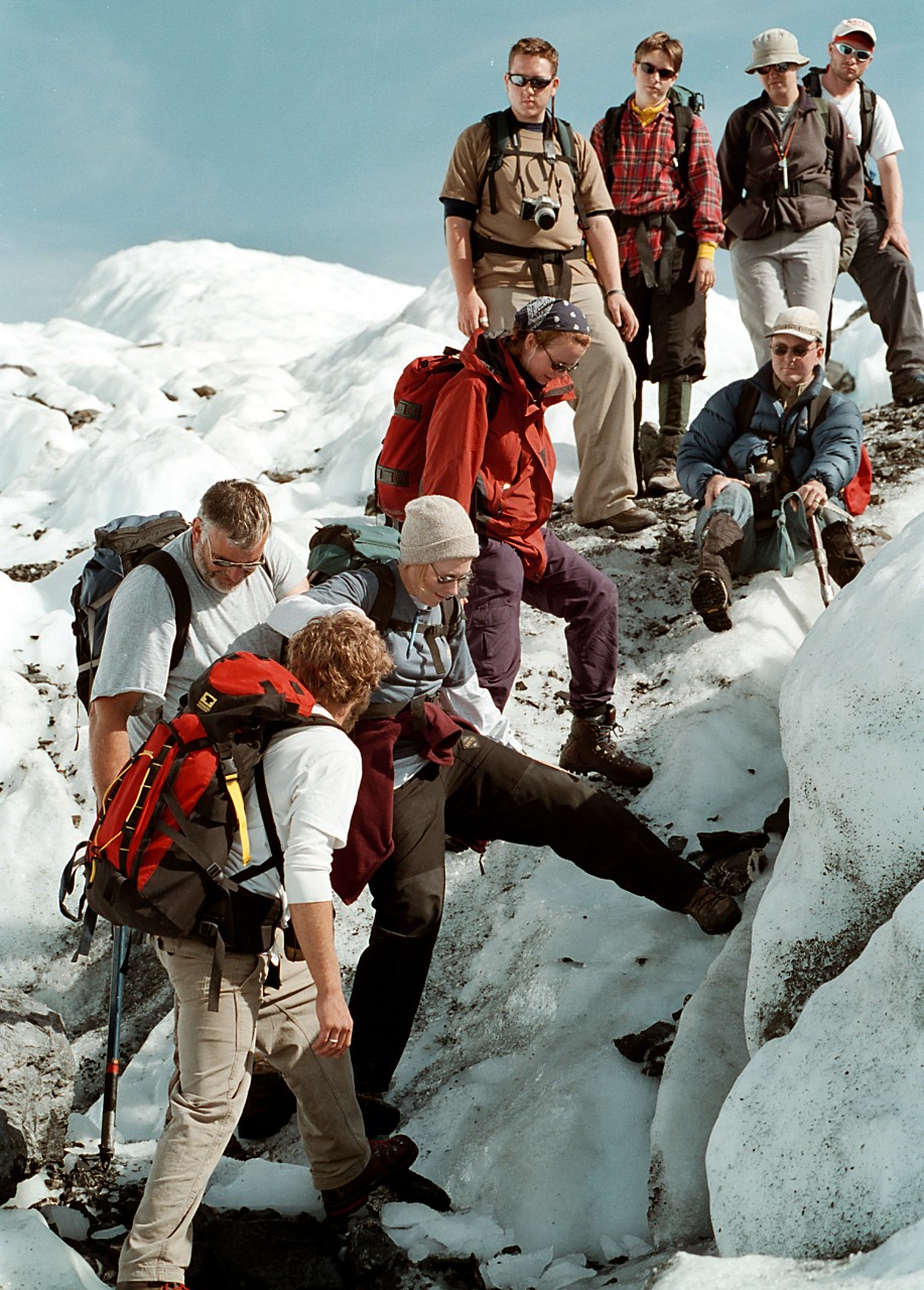 08/22/01 janelle - Janelle Sikorski (tan hat) coming down the  ice steps made by Tom Lowell during the hike at Matanuska Glacier.  Photo by Colleen Kelley