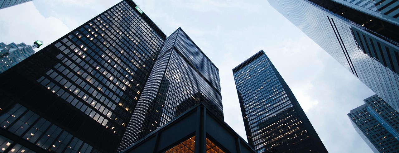 Ground view looking up at skyscrapers