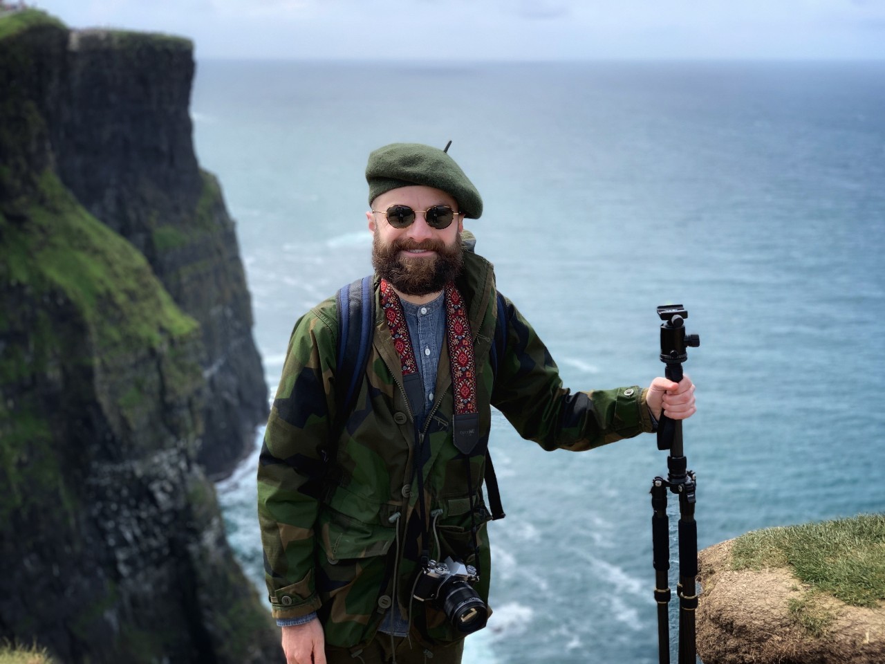 Law student on cliffs of moher overlooking ocean