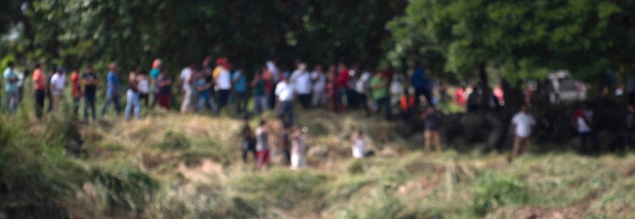 Out of focus photo of people lined up