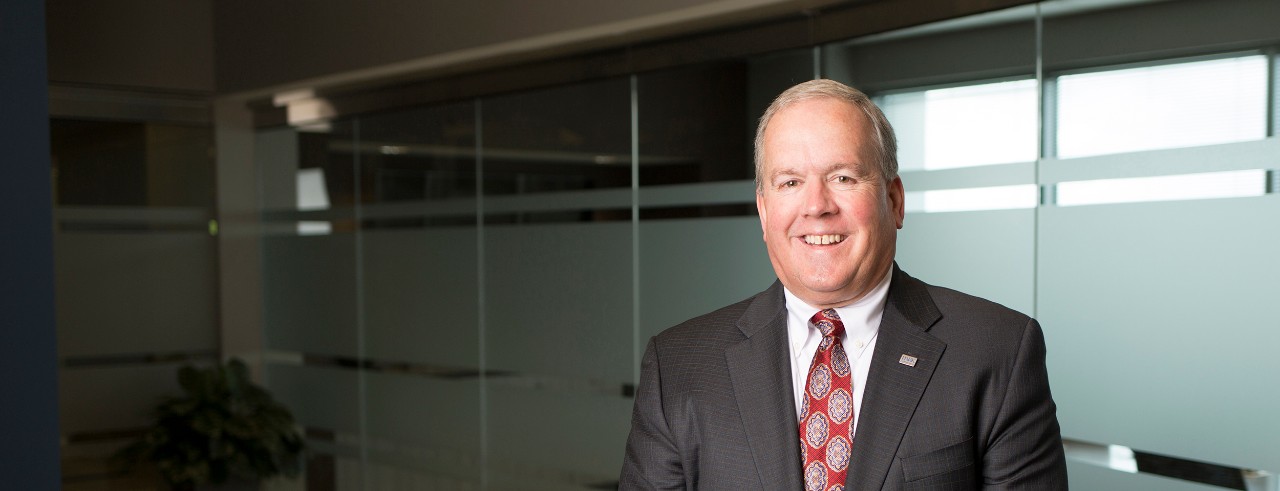 Photo of Bill Schumaker, a business man in empty office