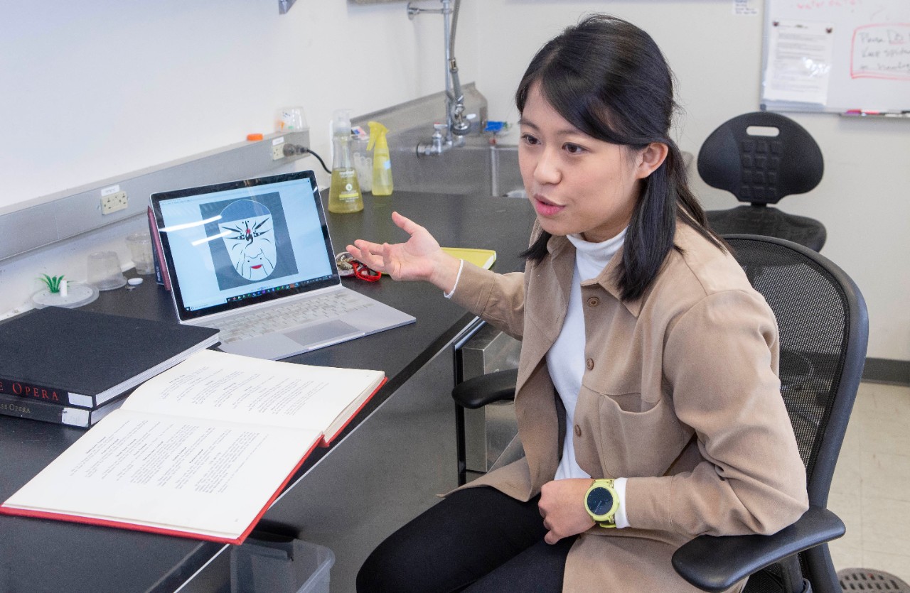 Jenny Yi-Ting Sung  PhD student at University of Cincinnati is looking at the evolution of Chinese opera masks and how these social customs compare to evolution of communication cues in nature at Rieveschl. UC/Joseph Fuqua II