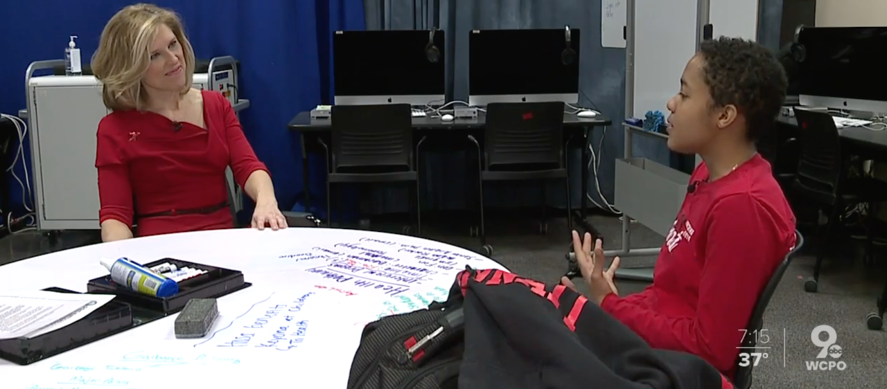 WCPO's Krysten Hartman interview UC's Mary Williams at Hughes High School