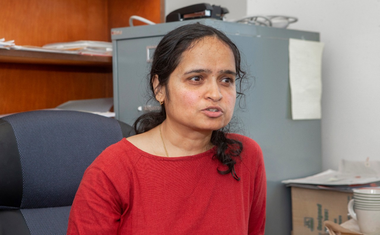 Shailaja Paik, PhD, history department associate professor shown here in her office McMicken Hall and on the campus of University of Cincinnati. UC/Joseph Fuqua II