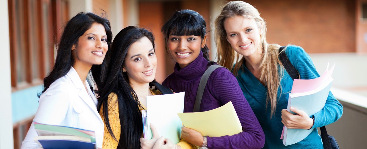 Group of women college students stand together