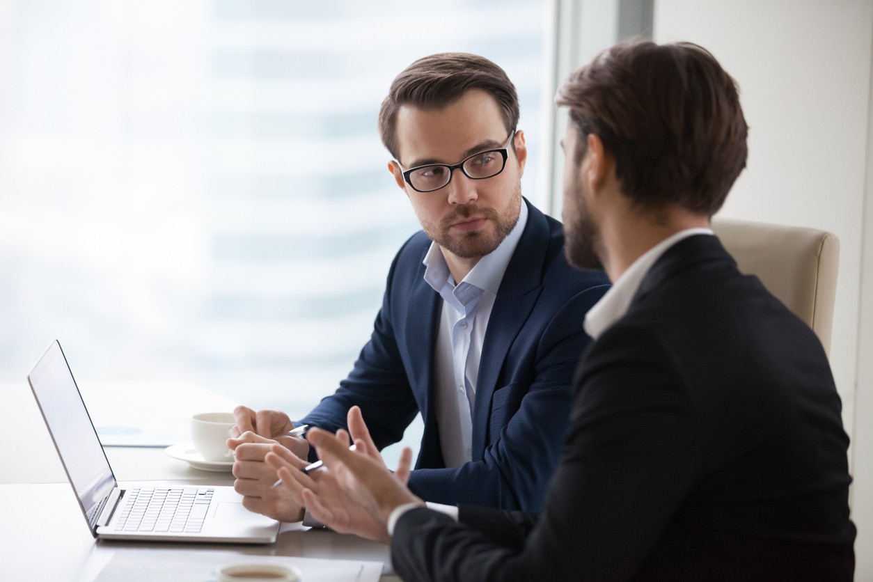 lawyer and client negotiation meeting
