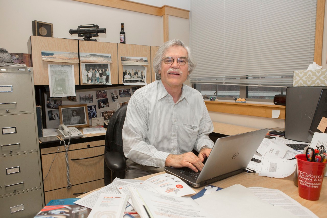 Vernon Scarborough works at a laptop.