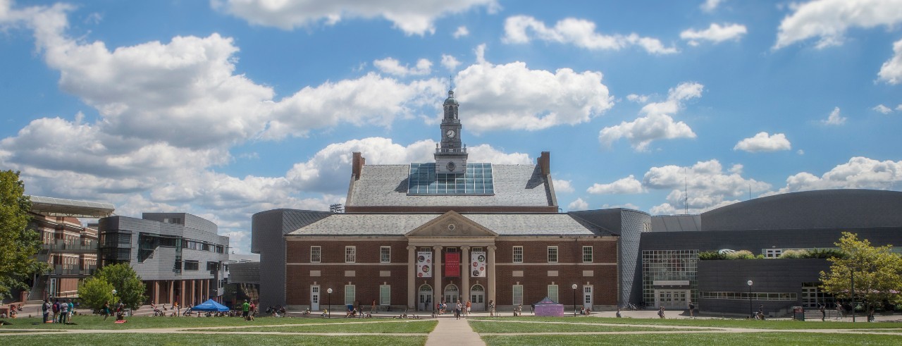 Tangeman University Center under bright sun and white clouds