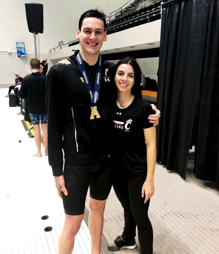 UC's Din and Enna Selmanovic stand together after a UC swim and diving competition.
