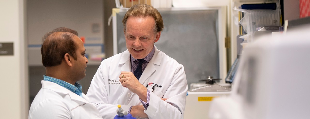 Richard Becker, MD, shown with colleague.