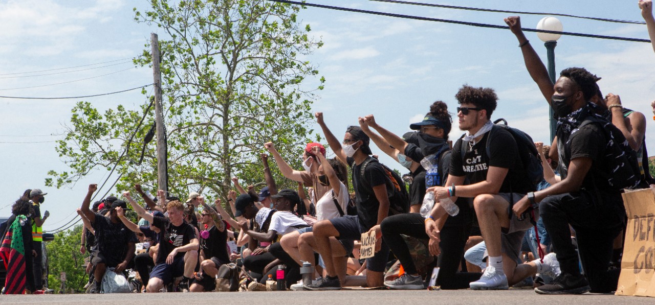 University of Cincinnati police Captain Rodney Carter, left and  University of Cincinnati police Assistant Chief Dudley Smith marched with protesters. About 800 protesters marched for George Floyd, Breonna Taylor and Ahmaud Arbery Wednesday June 3, 2020 as part of a Black Lives Matter Cincinnati action. UC/ Joseph Fuqua II