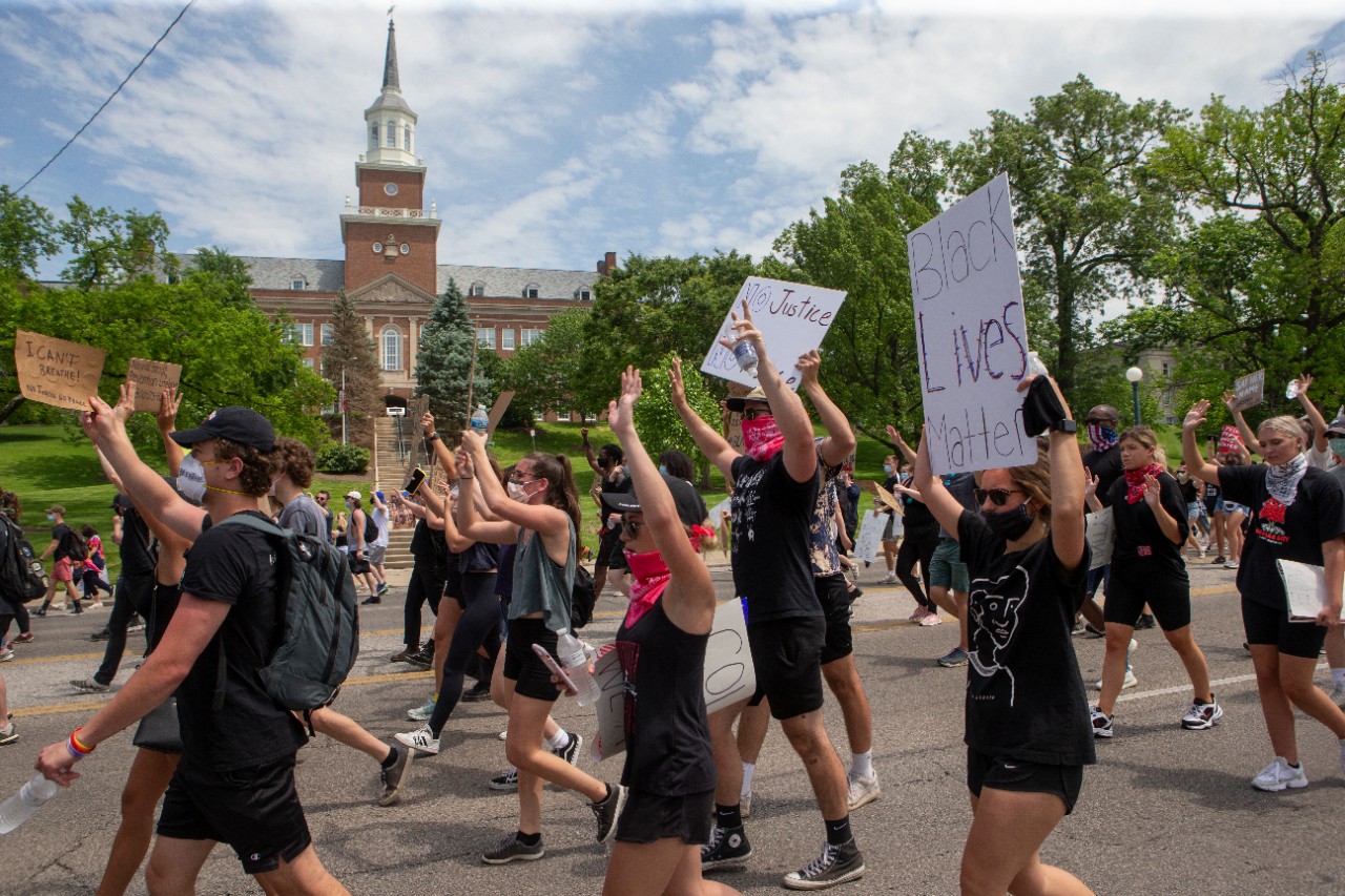 Protesters marched along Clifton Ave with McMicken Hall in the background. About 800 protesters marched for George Floyd, Breonna Taylor and Ahmaud Arbery Wednesday June 3, 2020 as part of a Black Lives Matter Cincinnati action. UC/ Joseph Fuqua II