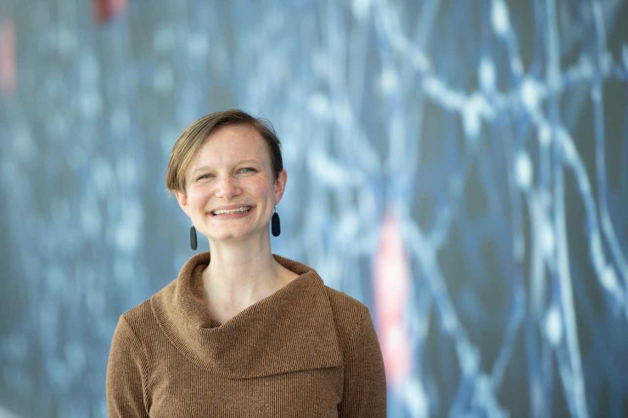 Emily Nurre, MD, in front of the UCGNI building.