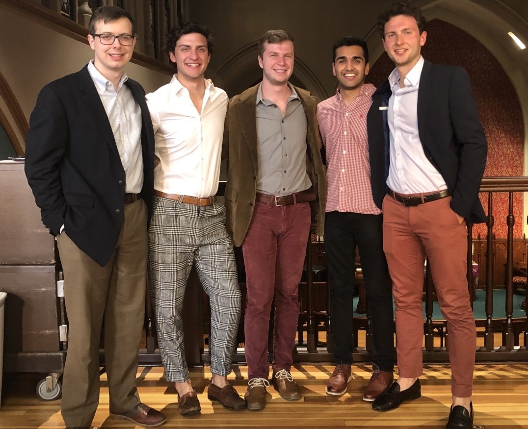 Benjamin Kuhlman smiles for a picture alongside four of his freshman roommates and fellow Kolodzik Business Scholars.