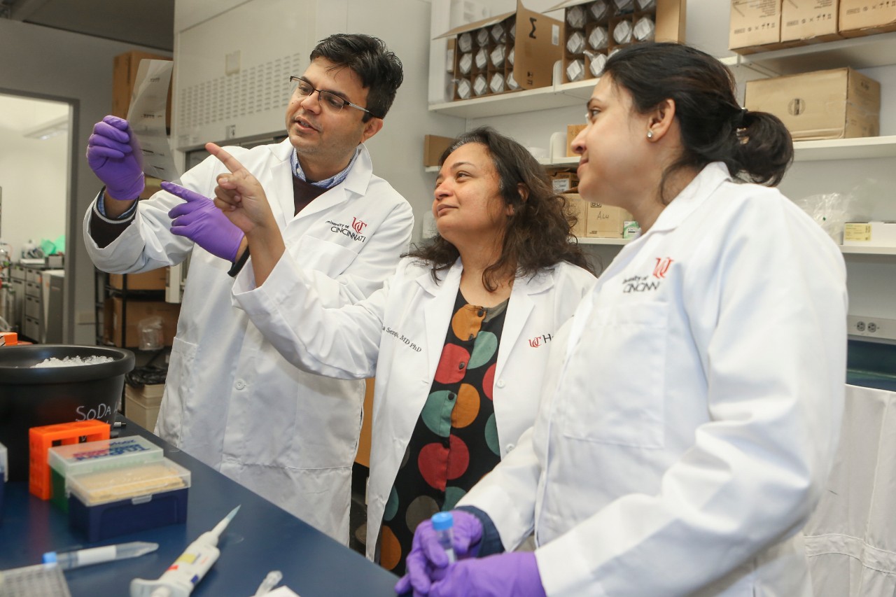 Left to right Dr. Debanjam Bhattacharya, Dr. Soma Sengupta, UCGNI,  and research assistant Eashika Chakraborty shown here working in Dr. Soma Sengupta’s lab at Vontz building. UC/Joseph Fuqua II