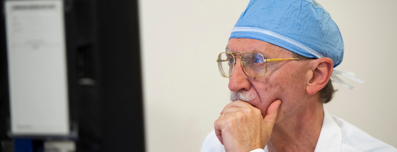 Dr. Mario Zuccarello looking at computer screen