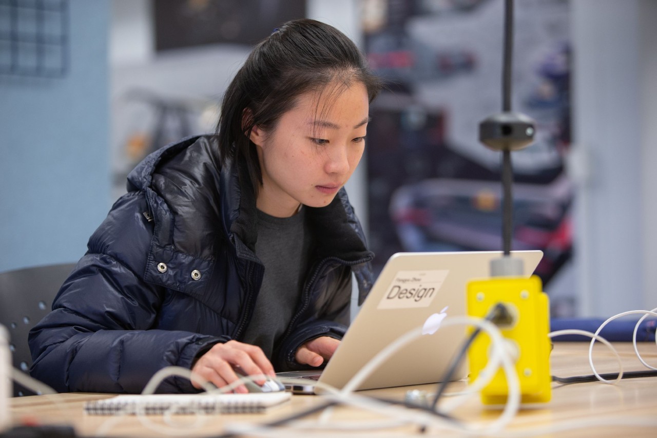Student at laptop in lab
