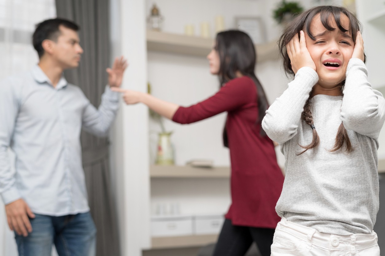parents arguing and child upset