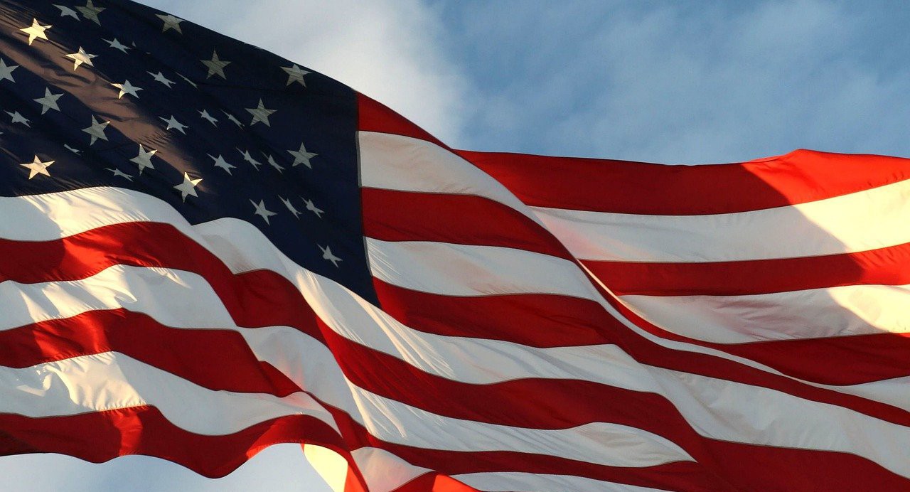American flag waving in the sky