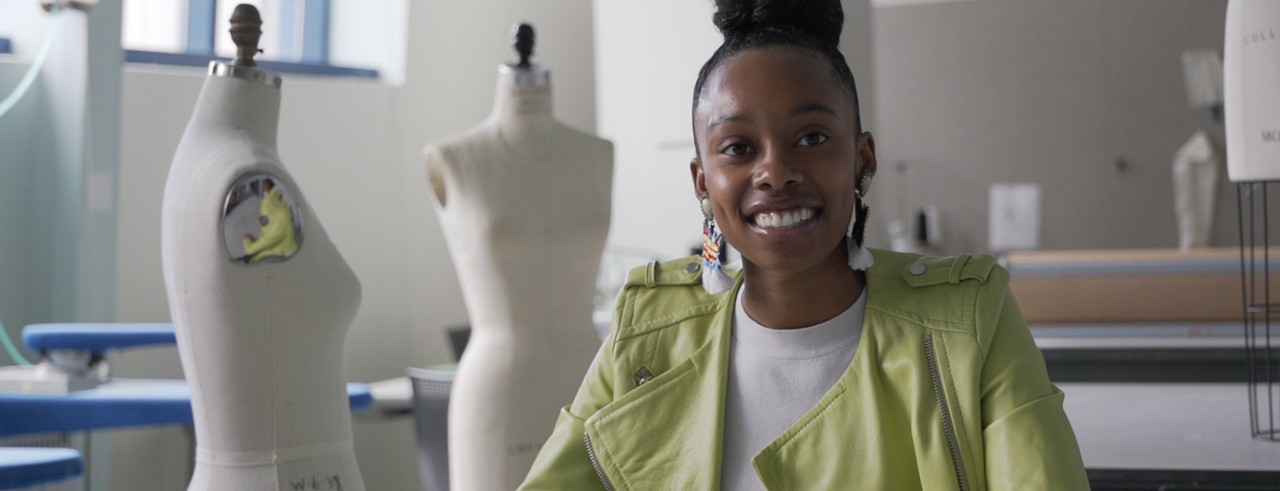 female student with yellow jacket
