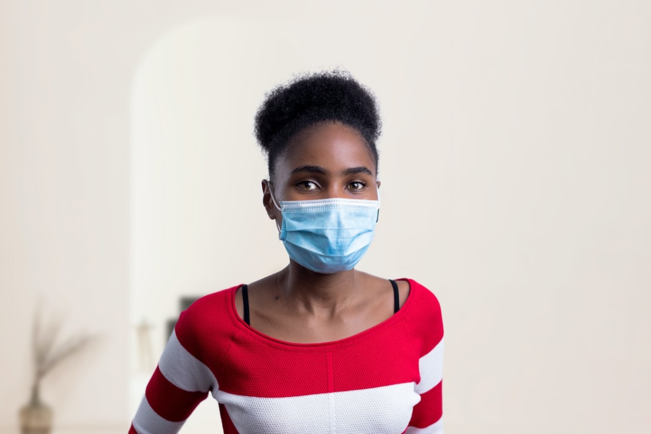 woman wearing a mask