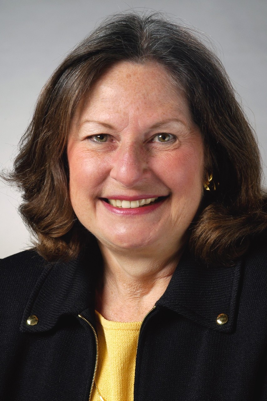 woman in yellow shirt