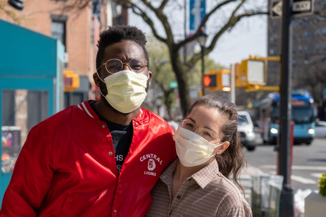 man with a mask with a woman in a mask